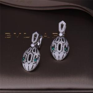 Quality Luxury Gold Brand Serpenti Earrings in 18K White Gold set with Emerald Eyes and with pavé diamonds Snake Head for sale