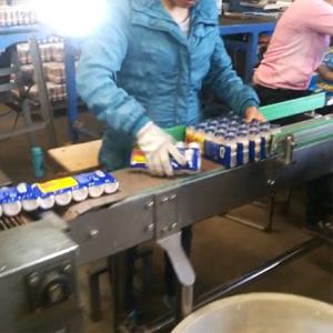 380V Grouping Automatic Screw Feeder Machine Collective Milk Packaging Line