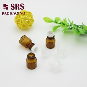 China SRS empty 1ml amber glass roll on perfume bottle with clear plastic cap on sale