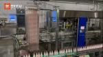 Fully Automatic High Speed Glass Bottle Label Sleeving Machine Customer Site