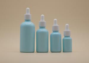 China Blue Coating Essential Oil Dropper Bottles White Ceramic Bottle For Personal Care on sale