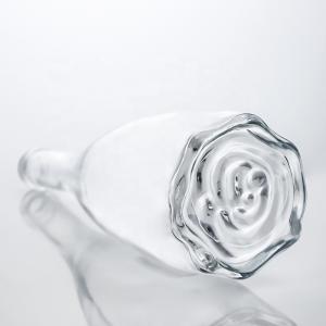 Quality Custom Logo Unique Floral Bottom Super Flint Long Neck 750ml Glass Bottle for Gin Cork for sale
