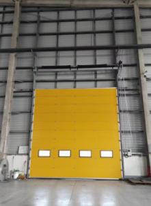 China Wind Resistant Sectional Industrial Door Heat Insulating For Factory And Hangar on sale