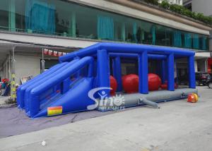 Quality Outdoor double lane adults interactive inflatable assault course with big bouncing balls for sale