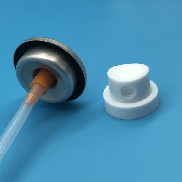 Premium sunscreen mist valve close-up showing nozzle design